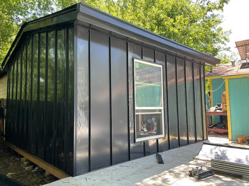 Black standing seam metal wall panels for Metal Roof Installation in Pell City